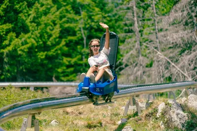 girl riding mountain coaster